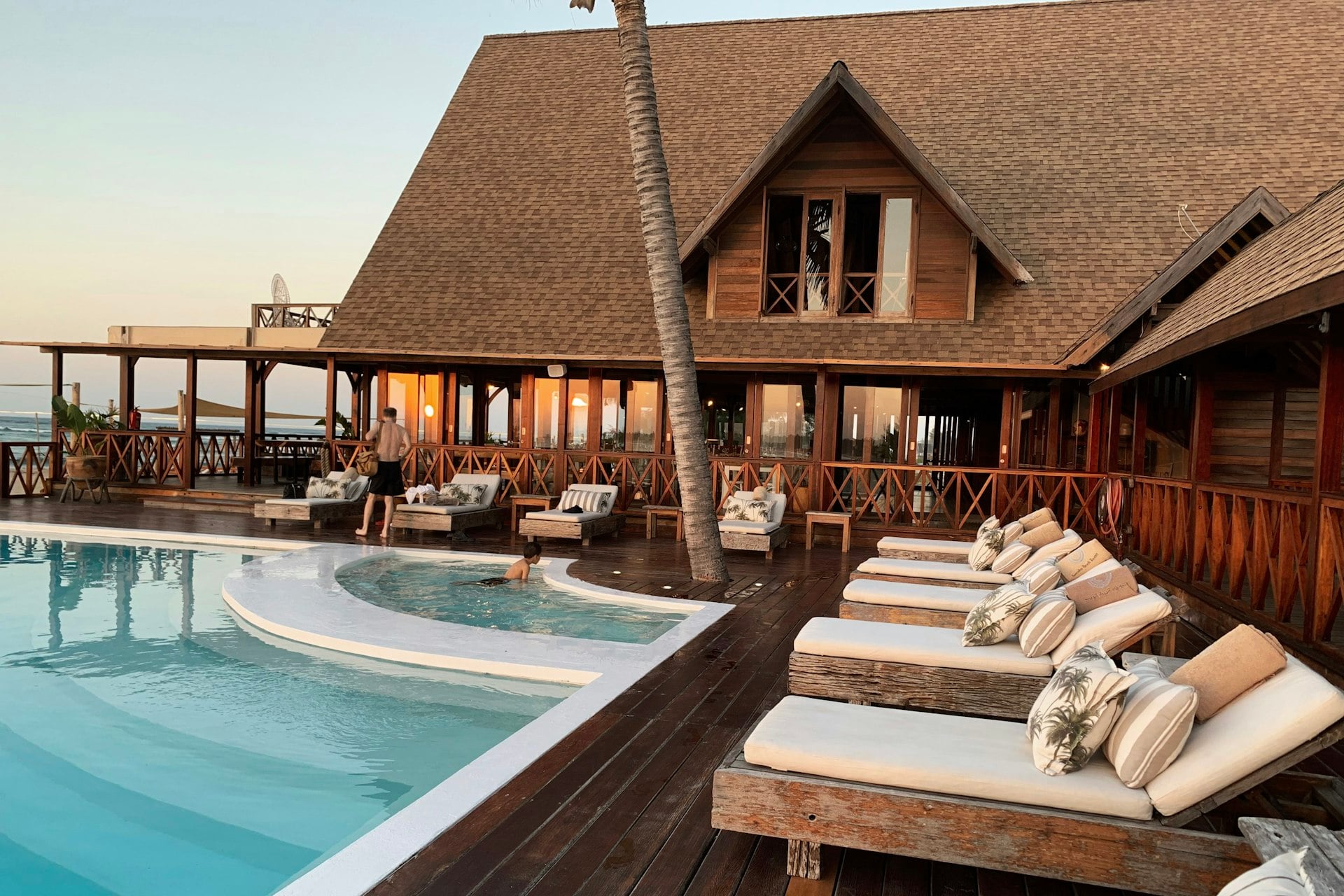 A luxury overwater resort at dusk